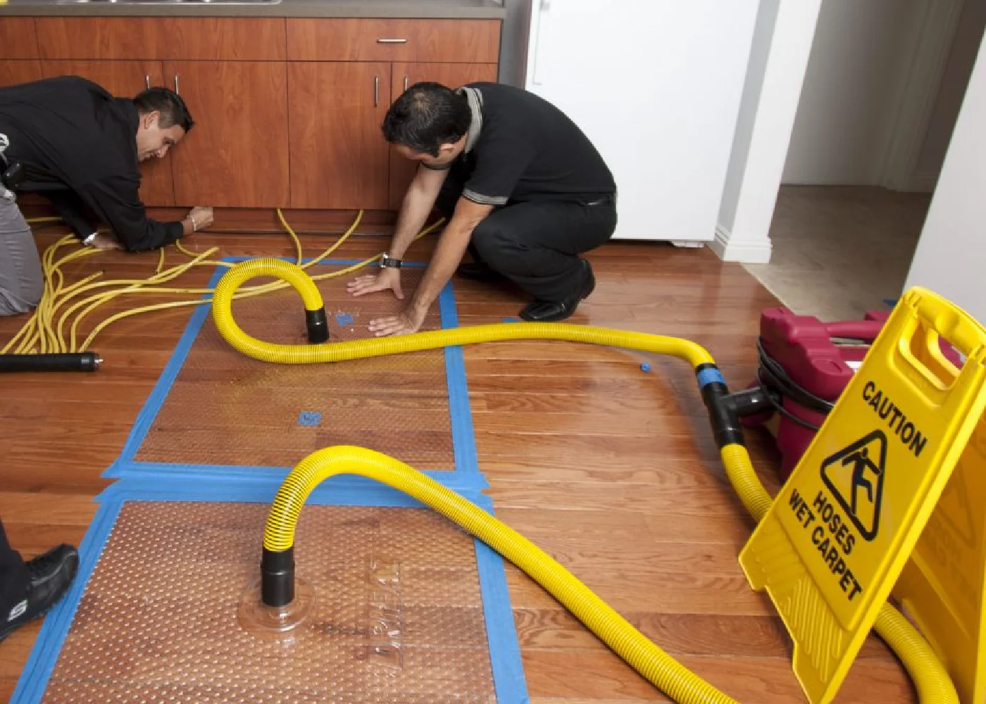 Restoration specialist working inside damaged property